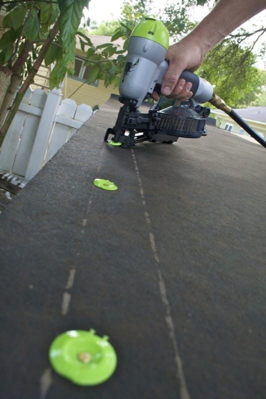 Cap Nailer installing tar roofing paper