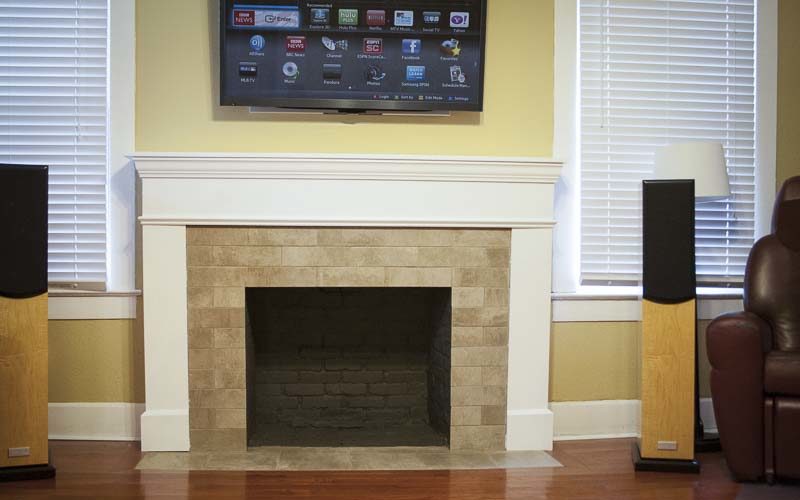 tile over brick fireplace completed
