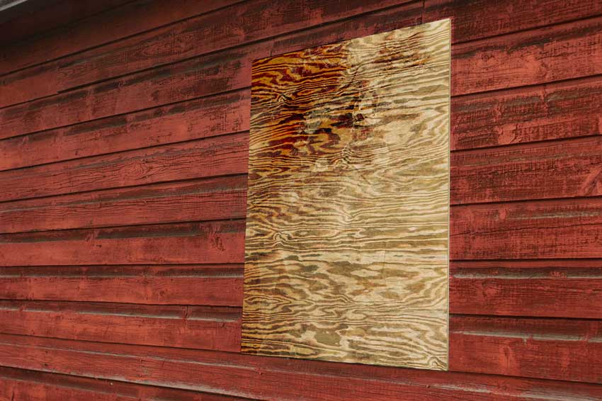 how to board up abandoned houses