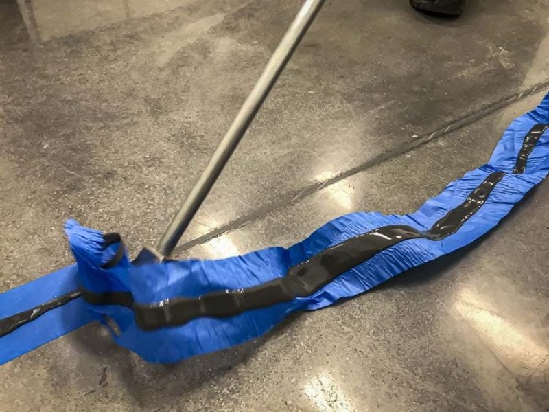 scraping concrete expansion joints