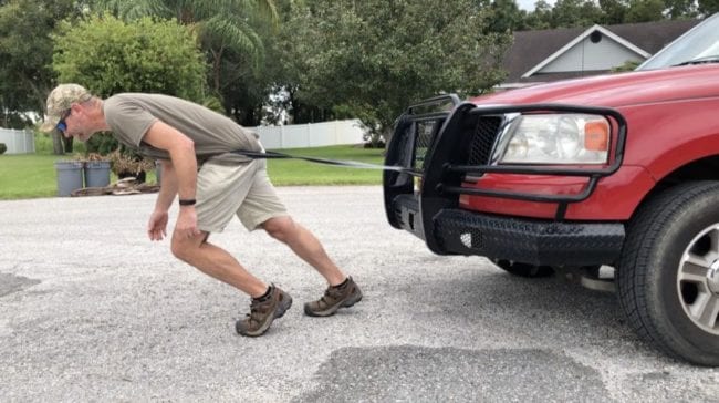 Kenny pulling pickup truck T-Rex tape