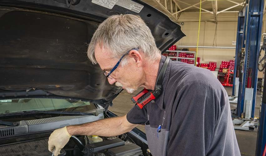 wearing Wurth dual LED light around neck