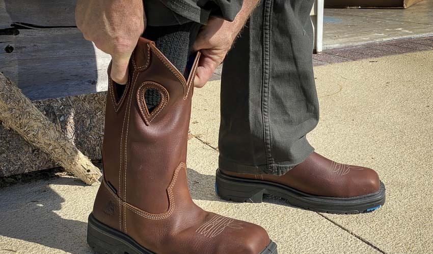 pulling on Steel Blue Blue Heeler boots