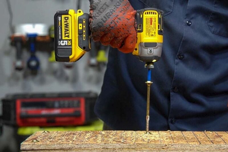 DeWalt fastening ledger screw into stacked OSB
