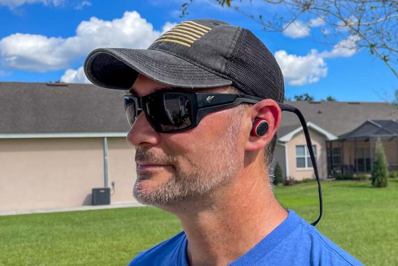 Wearing Milwaukee RedLithium USB Jobsite Ear Buds
