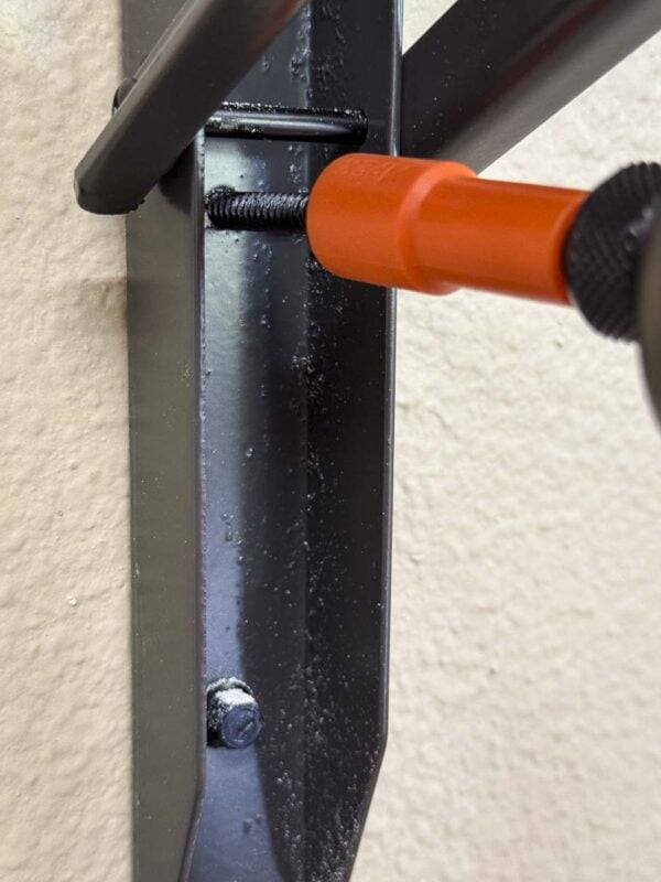 fastening mounting hinge bracket to wall